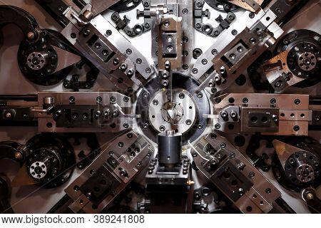 Cnc Spring Making Machine. Automatic Wire Bender Machine. Selective Focus.