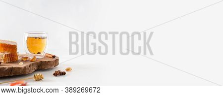 Flu, Covid-19 Treatment Banner. Strengthening Immunity In Autumn. Hot Tea In A Glass Cup, Honey Comb