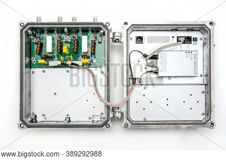 Catv System Hanging On Black Optical Fiber Cables For Amplify Tv Signals Installed With Coaxial Cabl