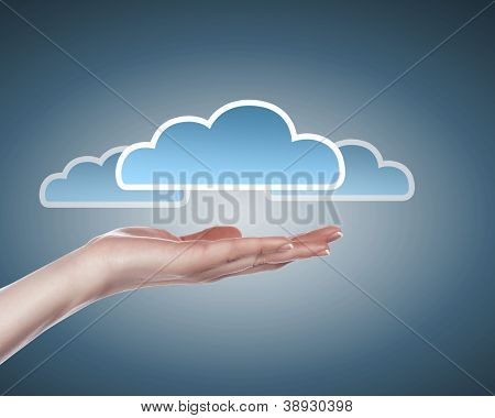 Hand med cloud computing symbol mot färg bakgrund