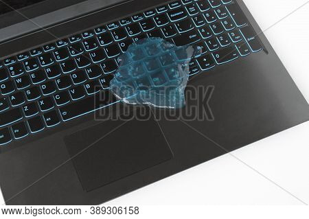 Blue Soft Gel Cleaning Dust On Keyboard. Concept Cleaning Your Computers Keyboard. Office Cleaning.
