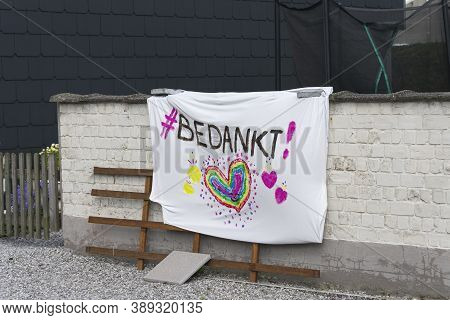 Sint Gillis Waas, Belgium, April 14, 2020, Banner With The Text Thank You Painted On It For The Peop