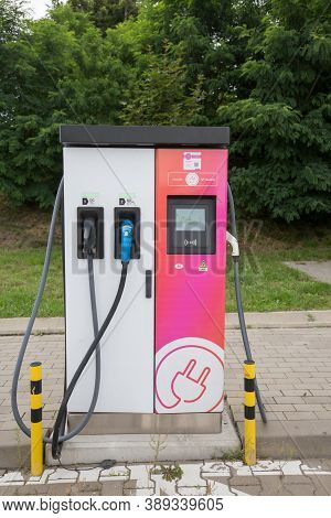 Katowice, Poland 18.07.2020 - Power Supply For Electric Car Charging. Pink Electric Car Charging Sta