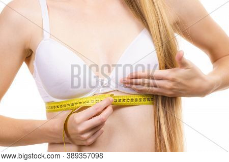 Woman Measuring Her Chest Under Breast