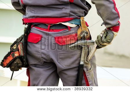 the tool belt with a construction worker on a construction site
