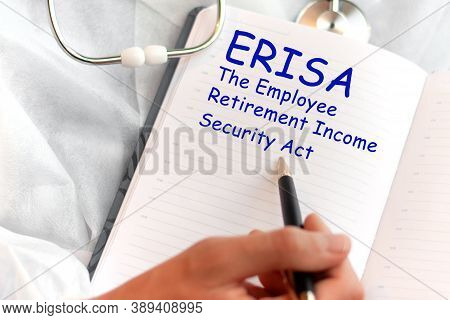 Doctor Holding A Card With Text Erisa, Medical Concept