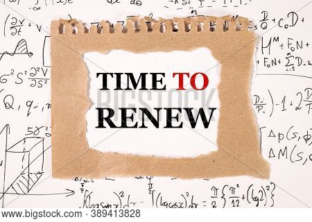 Time To Renew, Text On Torn Paper On A White Backing