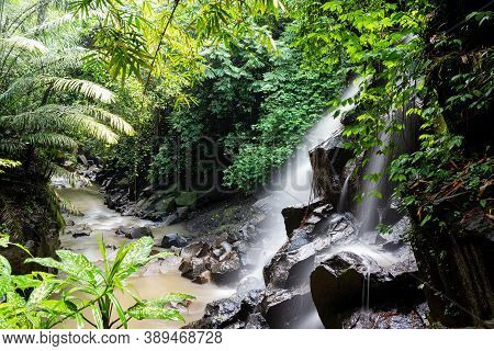 Kanto Lampo Located In Gianyar, Bali. Kanto Lampo Waterfall Good For Photography Object And Also Fin