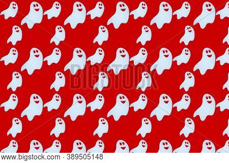 Cute Ghost On A Red Background.pattern Seamless For Halloween.