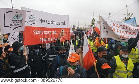 Warsaw, Poland 13.10.2020 - Protest Of The Farmers Crowd Marching With Flags And Slogan Banners. Hig