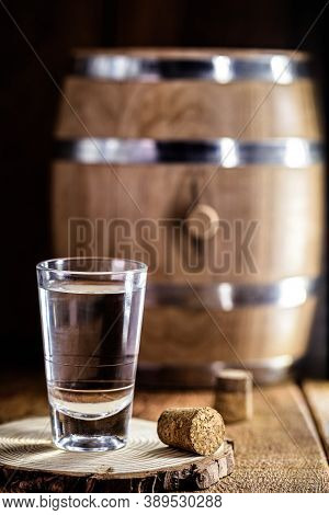 Small Glass Of Alcoholic Beverage, Distilled Drink Known As Cognac Or 