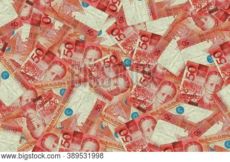 50 Philippine Piso Bills Lies In Big Pile. Rich Life Conceptual Background