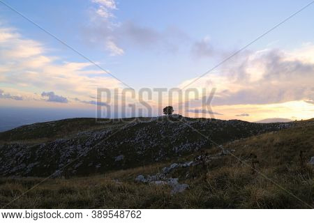 Sunset On Mount Pizzoc In Italy. High Quality Photo