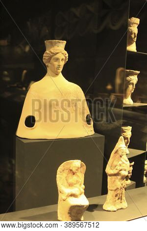 Alicante, Spain- October 8, 2020: Cauldrons Shaped Like Terracotta Female Head Exhibited At The Arch