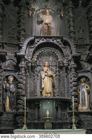 Lima, Peru - December 4, 2008: Closeup Of Blackened, Sculptured Reredos Behind Altar At Cathedral Sh