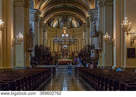 Lima, Peru - December 4, 2008: Wide Shot Of Main Altar In Chancel Seen From Nave In Cathedral. Rows 