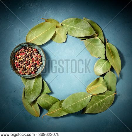 Square Culinary Design Template With Copy Space, With Bay Leaves And Peppercorns, Shot From The Top 