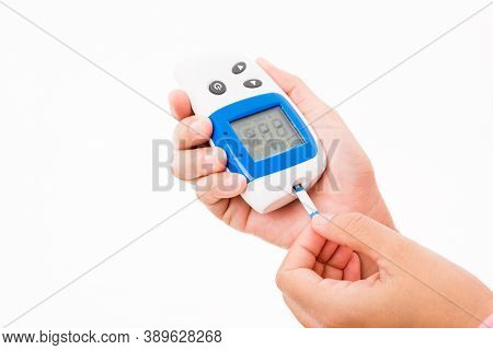 Closeup Hands Woman Measuring Glucose Test Level Checking On A Finger By Glucometer She Monitors And