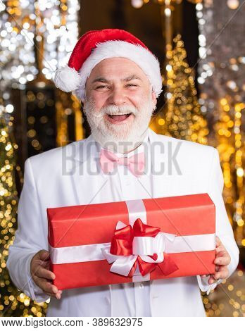 Bearded Grandfather Man Celebrate Christmas. Christmas Party. Senior Man With Beard. Christmas Gift.