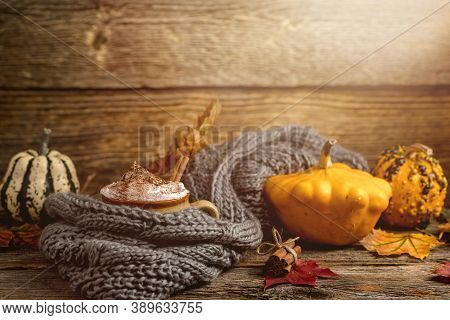 Autumn Concept, Still Life Of Pumpkin Latte With Whipped Milk Cream And Cinamon. Colorful Pumpkins A