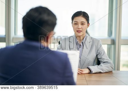 Young Asian Business Woman Looking For Job Being Interviewed By Human Resources Manager
