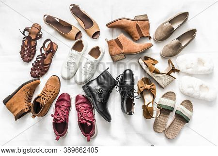 Variety Of Women's Fashion Comfortable Shoes Of All Seasons On A Light Background, Top View