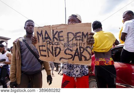 Lagos, Nigeria - October 12, 2020: Group Of Nigerian Youths Protesting Around The City About End Sar