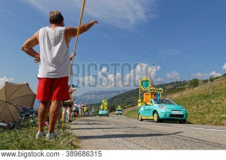 Revel, France, September 15, 2020 : Spectators And Advertsing Caravan On The Tour De France Roads. T