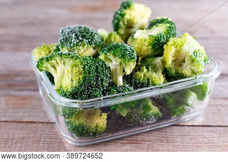 Frozen Broccoli In A Glass Container For Long-term Storage. Deep Freezing Of Vegetables.