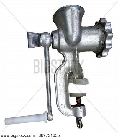Old Manual Non Working Aluminum Meat Grinder On A White Background