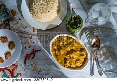 Authentic Indian Almond Chicken Korma Curry Dinner With Basmati Rice And Green Chutney