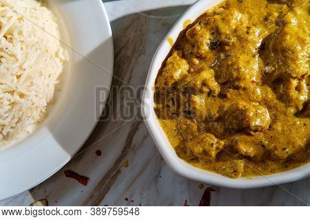 Authentic Indian Almond Chicken Korma Curry Dinner With Basmati Rice And Green Chutney