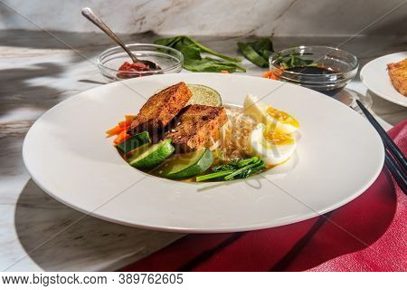 Thai Vegetarian Red Curry Rice Noodle Soup With Crispy Fried Tofu And Soft Boiled Egg