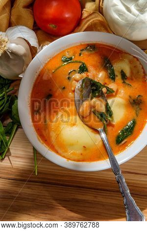 Creamy Italian Cheese Ravioli Soup With Cannellini Beans And Spinach
