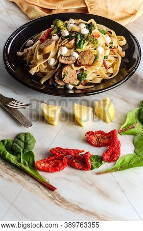 Italian Chicken Sausage Fettuccine Primavera In A Garlic White Wine Sauce With Broccoli Mushrooms Ba