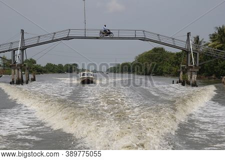 Lampung, Indonesia. September 15, 2013: A Motorboat Was Speeding Up The Mesuji River In Lampung, Ind