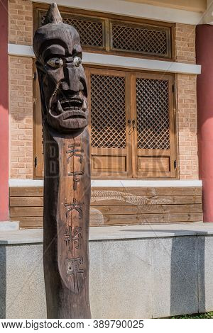 Chilgapsan, South Korea; October 2, 2020: For Editorial Use Only. Jangseung Totem In Front Of Buildi