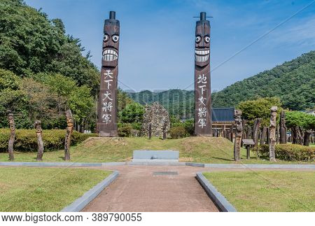 Chilgapsan, South Korea; October 2, 2020: For Editorial Use Only. Two Towering Korean Totem Poles Wi