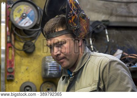 Close-up Portrait Of A Welder In The Workplace