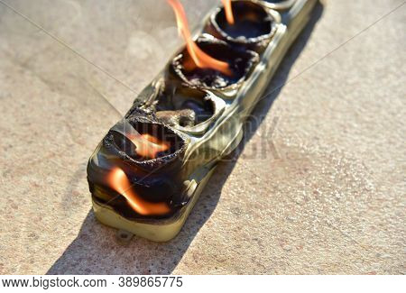 Outlets With Switche Caught Fire In Room. Overloaded Electrical Current Or Short In Device From Many