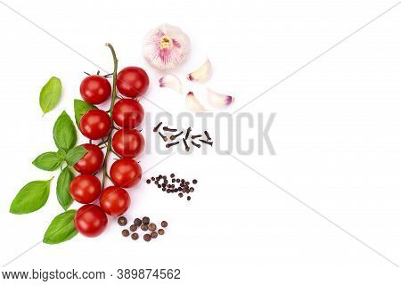 Top View Of Red ​​tomato Cherry With Green Basil Leaves And Young Garlic, Spice, Isolated On White B