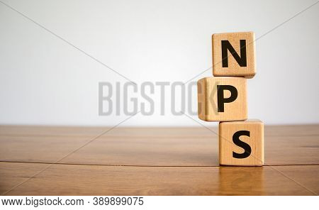 Wood Cubes With Acronym Nps - Net Promoter Score On A Beautiful Wooden Table, White Background. Busi