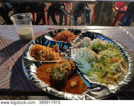 Indian Village Celebration Food For Guests With Some Indian Spices Eggplant And Dal Rice On A Table