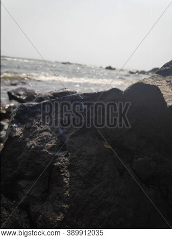 Stones At Beach With Beautiful Sea Water Closeup