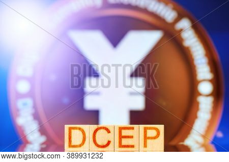 Dcep. Wooden Blocks With Dcep Lettering On Digital Yuan Coin Background