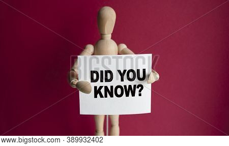The Wooden Man Holds A White Sign With The Text Did You Know In His Hands. The Content Of The Letter
