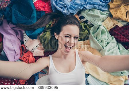 High Angle Top Above Closeup Photo Of Nice Lady Home Spring Cleaning Household Lying Clothes Stack M