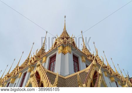 Loha Prasat Wat Ratchanatda Pagoda, A Buddhist Temple Or Wat Saket Buildings With Blue Sky In Bangko