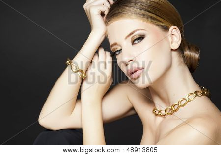 Gold Jewelry On Beautiful Woman Model Posing Glamorous