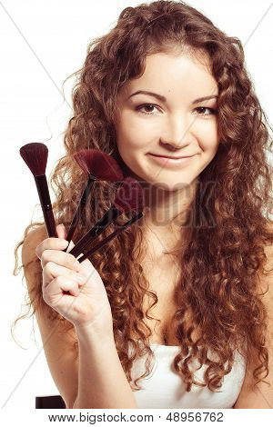 Frau macht make-up